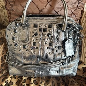 Like new Coach bag metallic silver with black studs